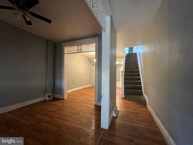 interior space with ceiling fan and hardwood / wood-style floors