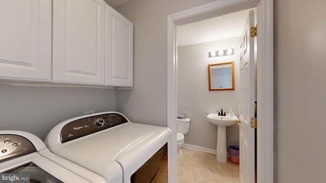 laundry room featuring washing machine and clothes dryer