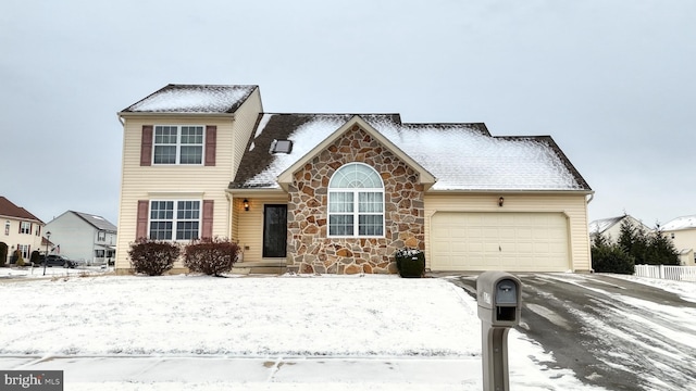 view of front of home with a garage