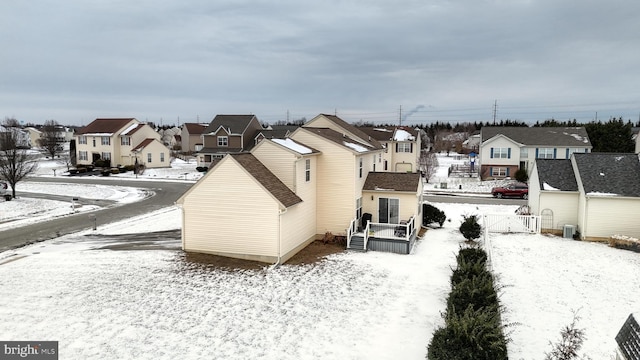 view of snow covered house