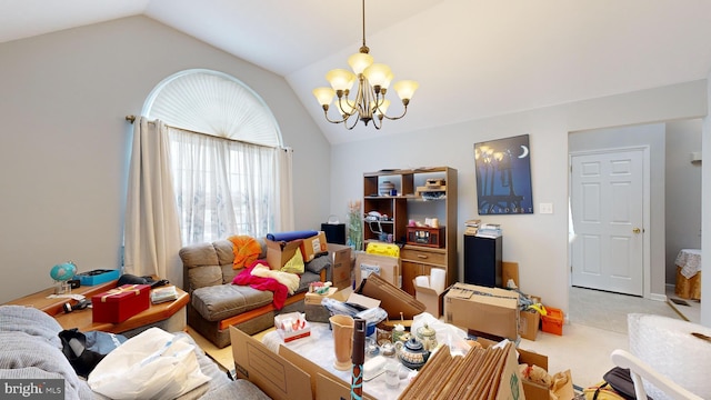 interior space with a chandelier and lofted ceiling