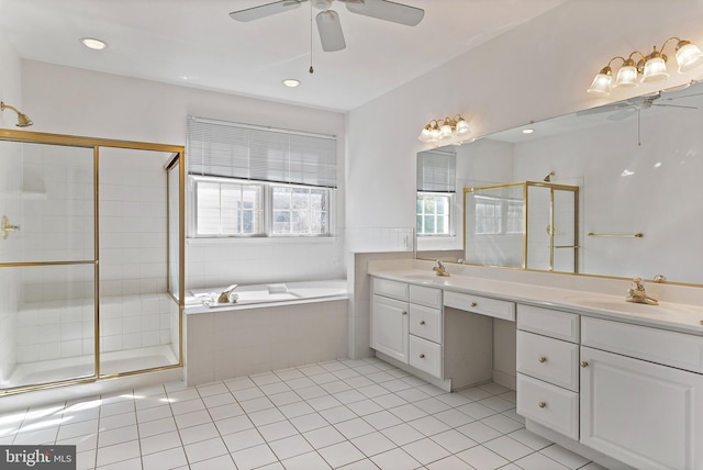 full bath featuring double vanity, tile patterned flooring, a sink, and a shower stall