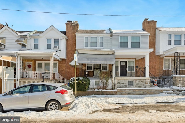 multi unit property featuring a porch