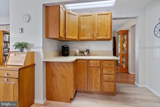 kitchen with light hardwood / wood-style floors