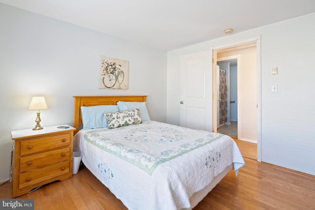 bedroom with light hardwood / wood-style floors