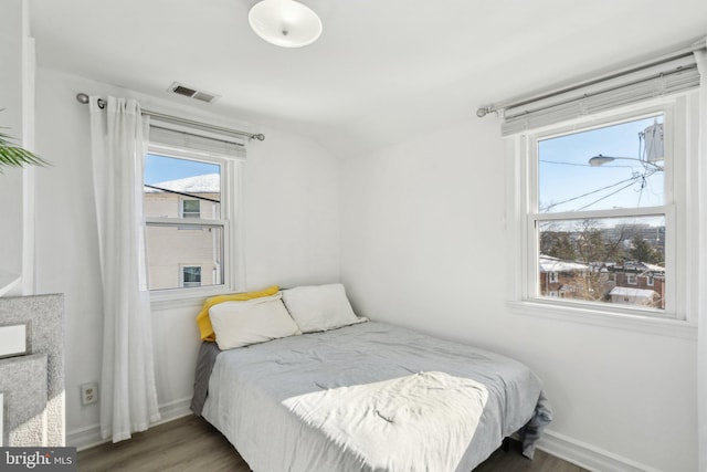 bedroom featuring hardwood / wood-style floors