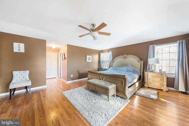 bedroom featuring ceiling fan and light hardwood / wood-style flooring