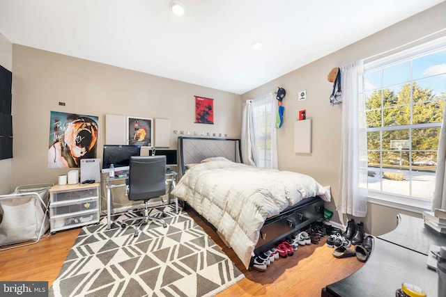 bedroom featuring light wood-type flooring