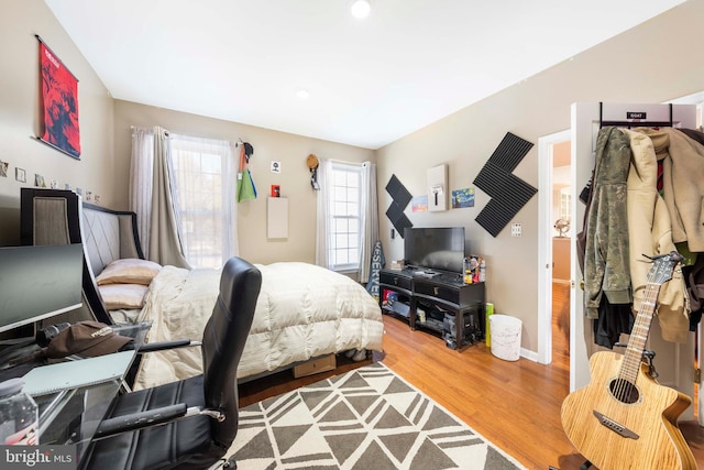 bedroom featuring hardwood / wood-style flooring