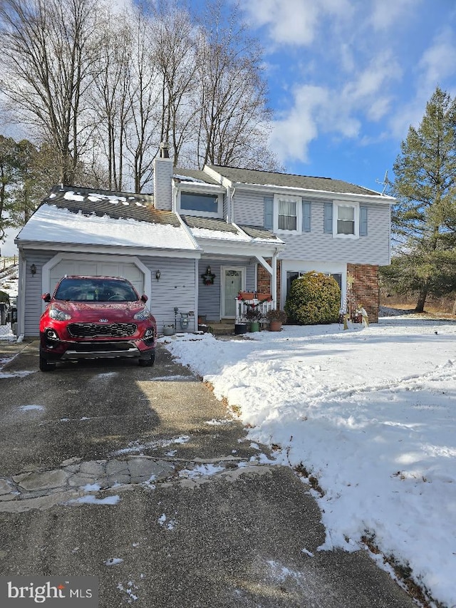 view of front of home with a garage