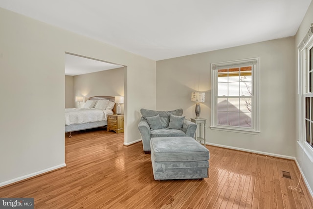 sitting room featuring hardwood / wood-style flooring