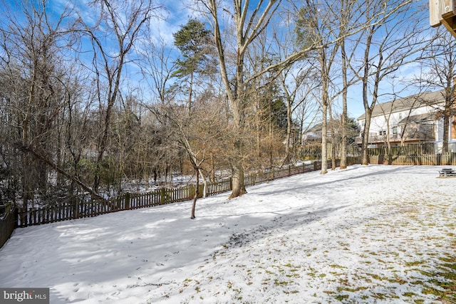 view of yard covered in snow