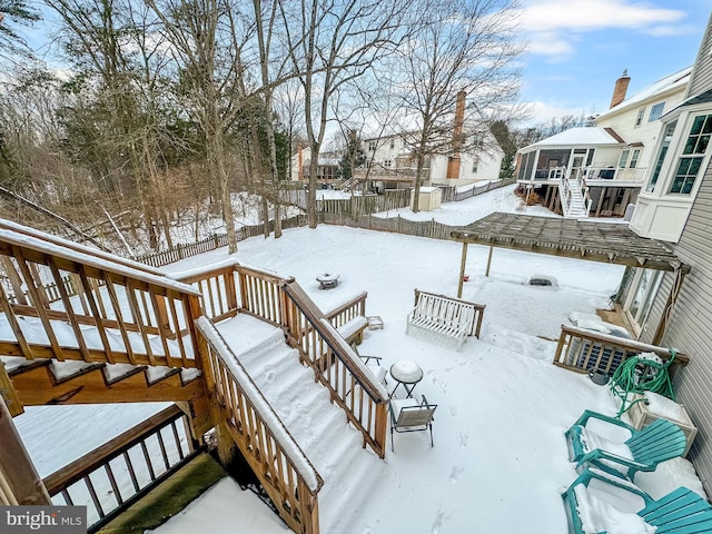 view of snow covered deck