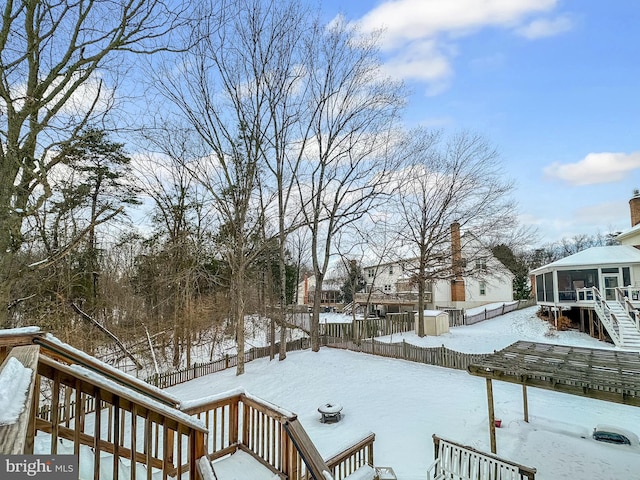 view of yard covered in snow