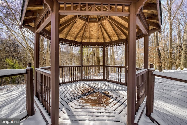 snow covered deck featuring a gazebo