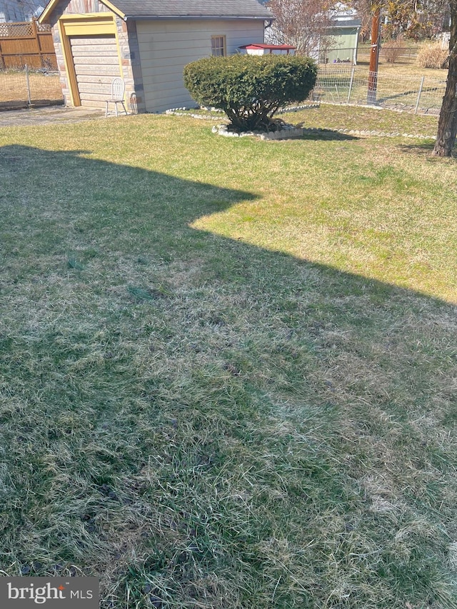 view of yard with fence