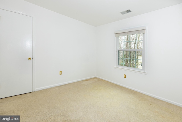 unfurnished room with carpet floors