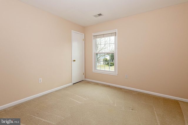 spare room with carpet flooring