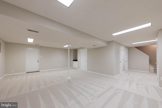 basement with light carpet