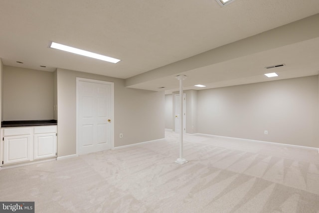 basement with light carpet