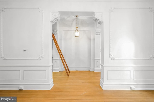 interior details featuring hardwood / wood-style flooring