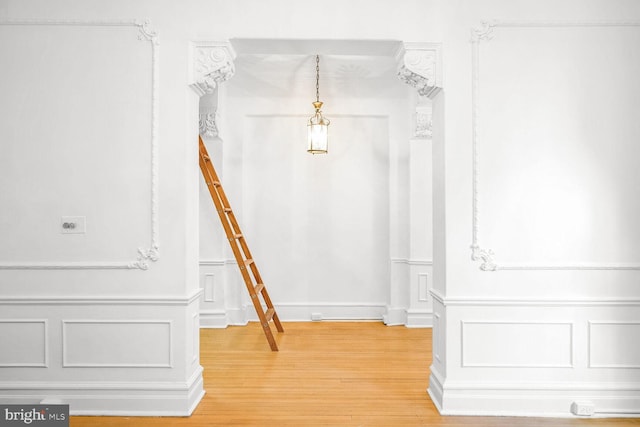 interior details with hardwood / wood-style flooring