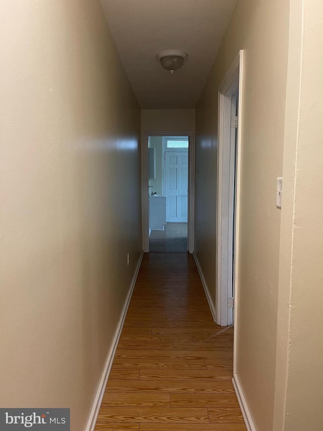 corridor featuring light hardwood / wood-style flooring