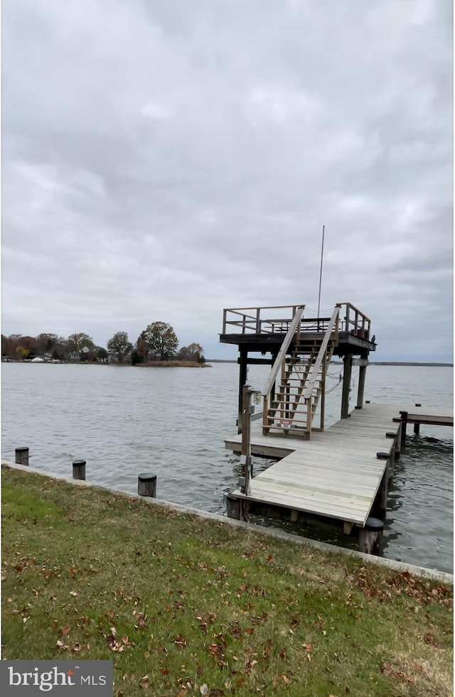 dock area featuring a water view