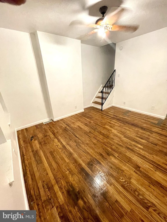 interior space featuring ceiling fan and hardwood / wood-style flooring