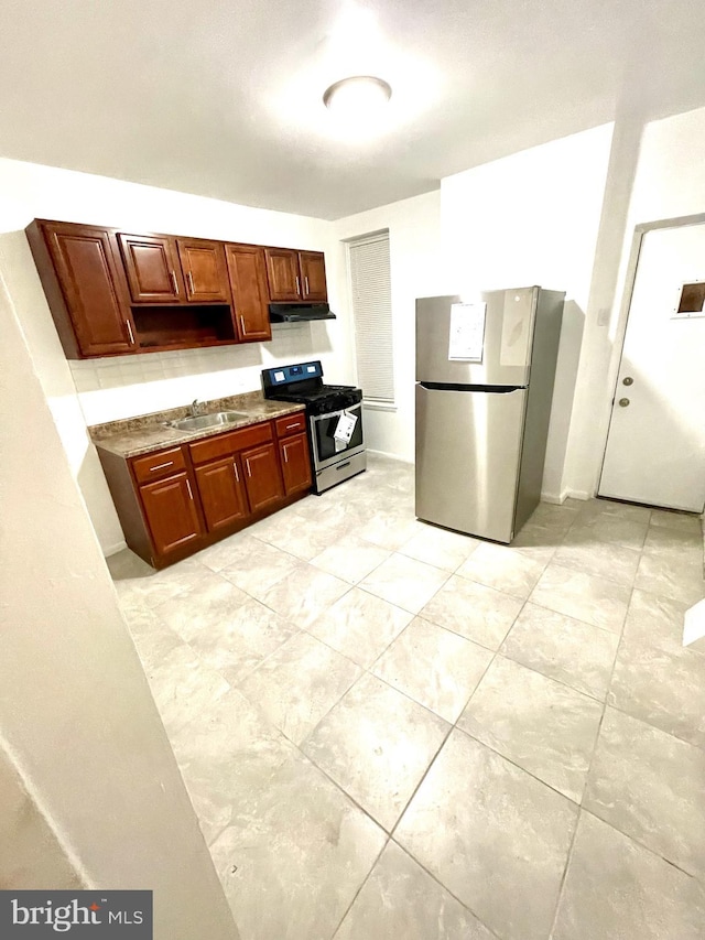 kitchen with appliances with stainless steel finishes and sink