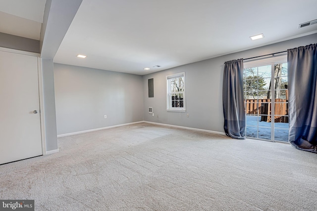 empty room featuring light carpet