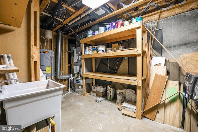 storage room with sink and water heater