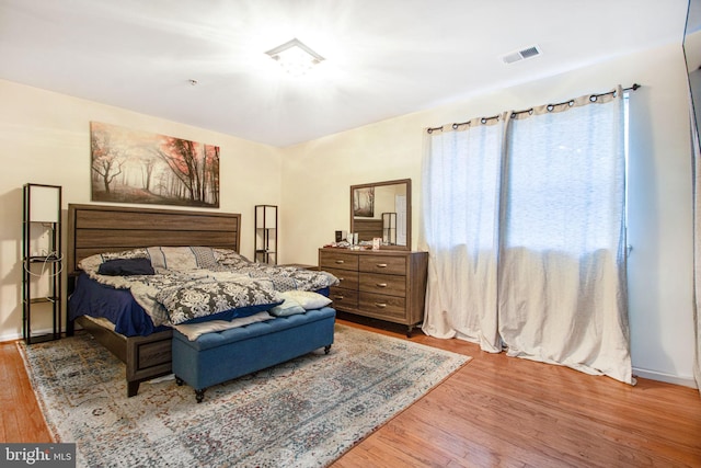 bedroom featuring wood-type flooring