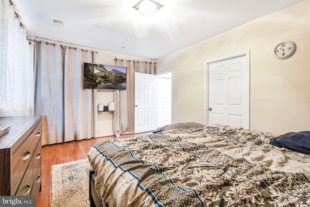 bedroom featuring light hardwood / wood-style floors