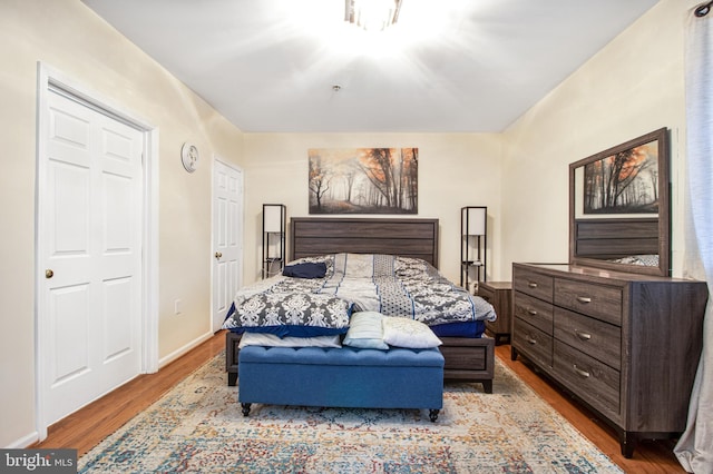 bedroom with light hardwood / wood-style flooring