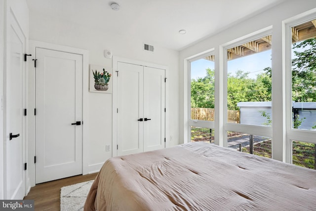 bedroom featuring hardwood / wood-style flooring