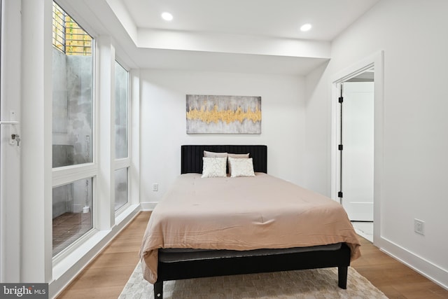 bedroom with wood-type flooring