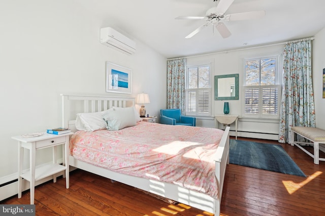 bedroom with a baseboard heating unit, an AC wall unit, ceiling fan, and dark hardwood / wood-style floors