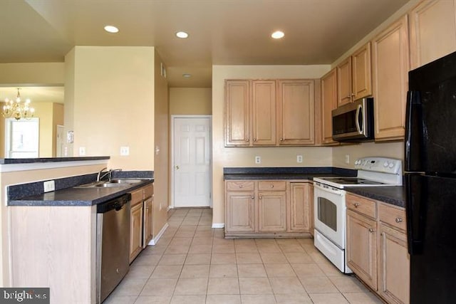 kitchen featuring sink, light tile patterned floors, a notable chandelier, and appliances with stainless steel finishes