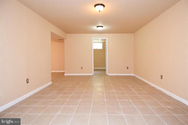 unfurnished room featuring light tile patterned floors