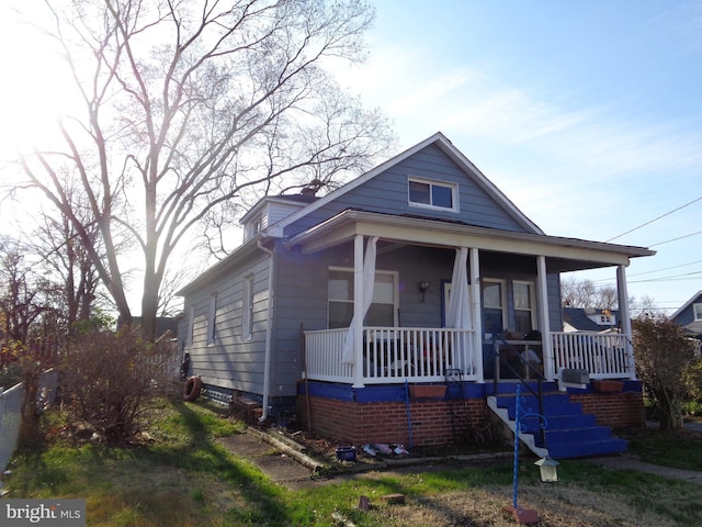 bungalow-style house featuring covered porch