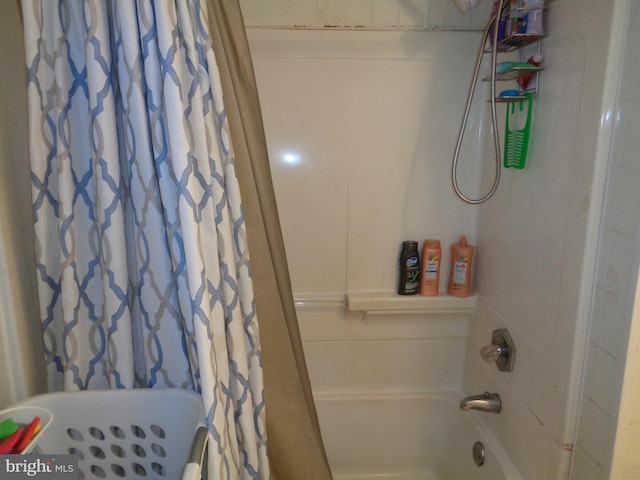 bathroom with shower / bath combo