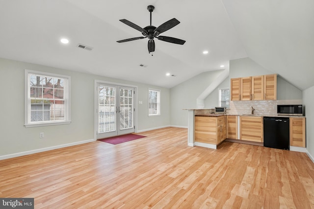 kitchen featuring light hardwood / wood-style flooring, dishwasher, light brown cabinetry, and tasteful backsplash