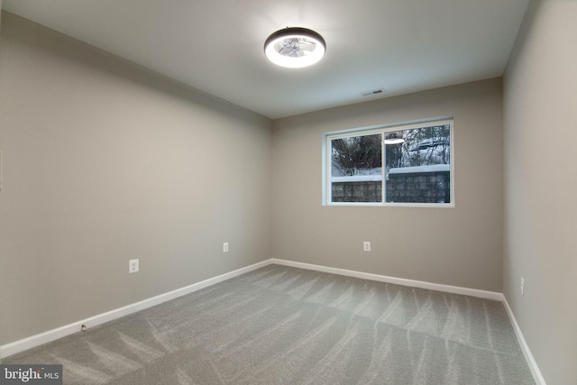 view of carpeted spare room