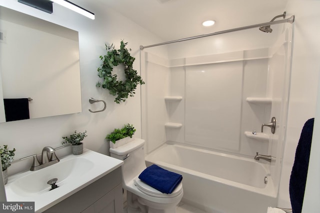 full bathroom featuring vanity,  shower combination, and toilet