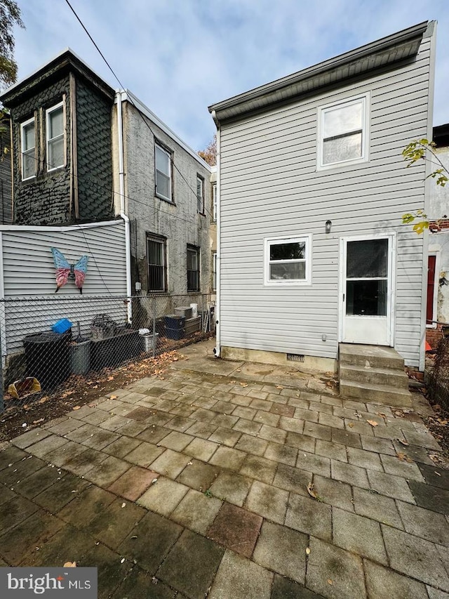 rear view of house featuring a patio area