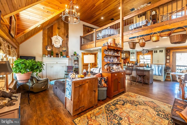 living room featuring dark hardwood / wood-style flooring, high vaulted ceiling, wooden ceiling, and an inviting chandelier