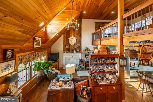 living room with high vaulted ceiling, an inviting chandelier, dark wood-type flooring, and wood ceiling