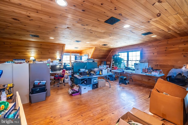 office space with light hardwood / wood-style floors, wood ceiling, and vaulted ceiling