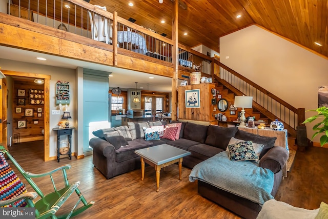 living room with high vaulted ceiling, wooden ceiling, and hardwood / wood-style flooring